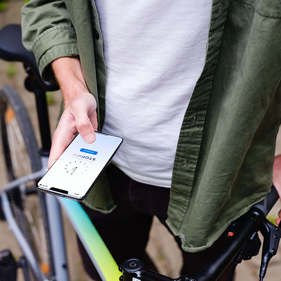 mockuuups-holding-samsung-s20-mockup-in-front-of-a-bike.jpeg
