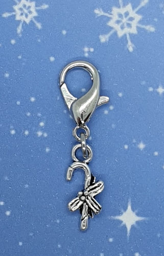 Thumbnail: Candy cane silver coloured metal charm with large ring on knitting needle
