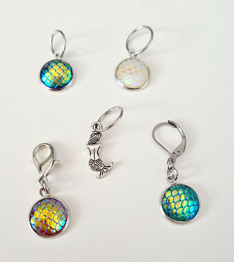 Thumbnail: mermaid shaped silver coloured metal charm with 4 multi irridescent cabochon charms on silver coloured metal backs with rings