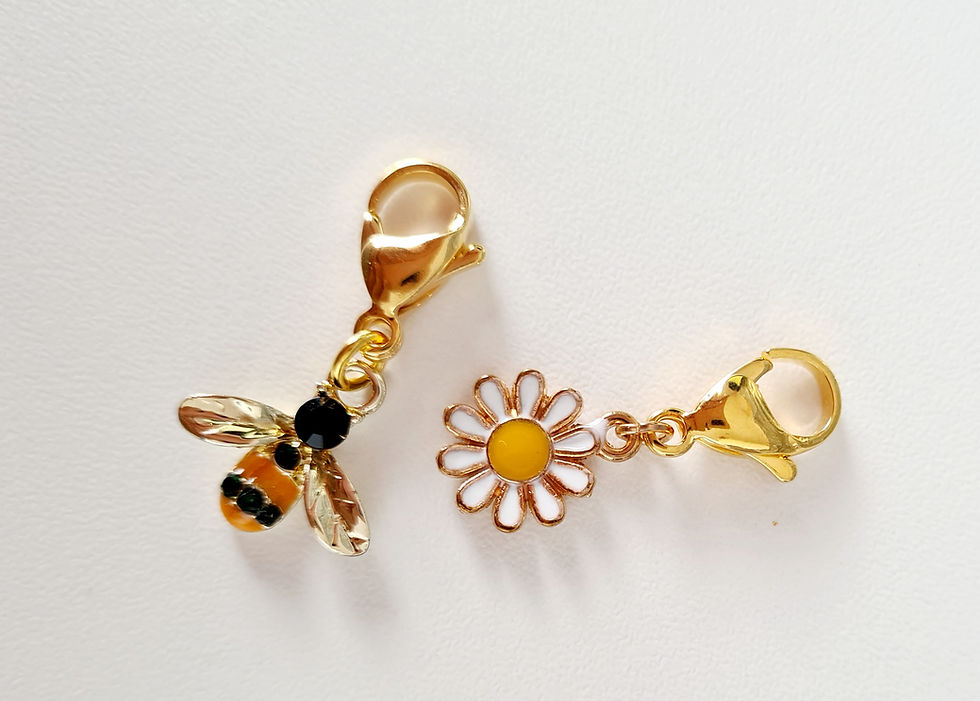 Thumbnail: one bee and one daisy stitch marker charm with lobster clasps