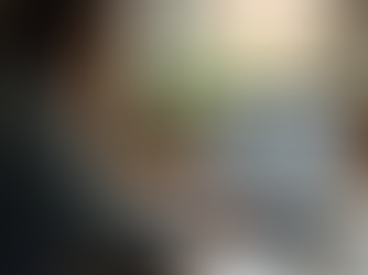 Eye-level view of a laptop screen showing a Wix website editor interface