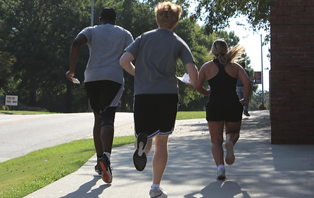 The winning team runs from one station to the next. Contributed photo