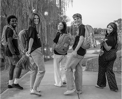 The five social media ambassadors pose for a group photo on campus. University Relations photo