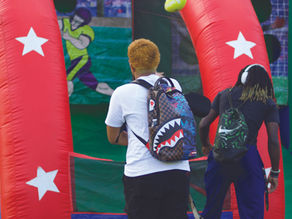 Students bounce around inflatables