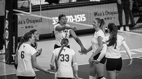 Troy volleyball encourages each other during its match against Southern Miss. Troy Athletics photo
