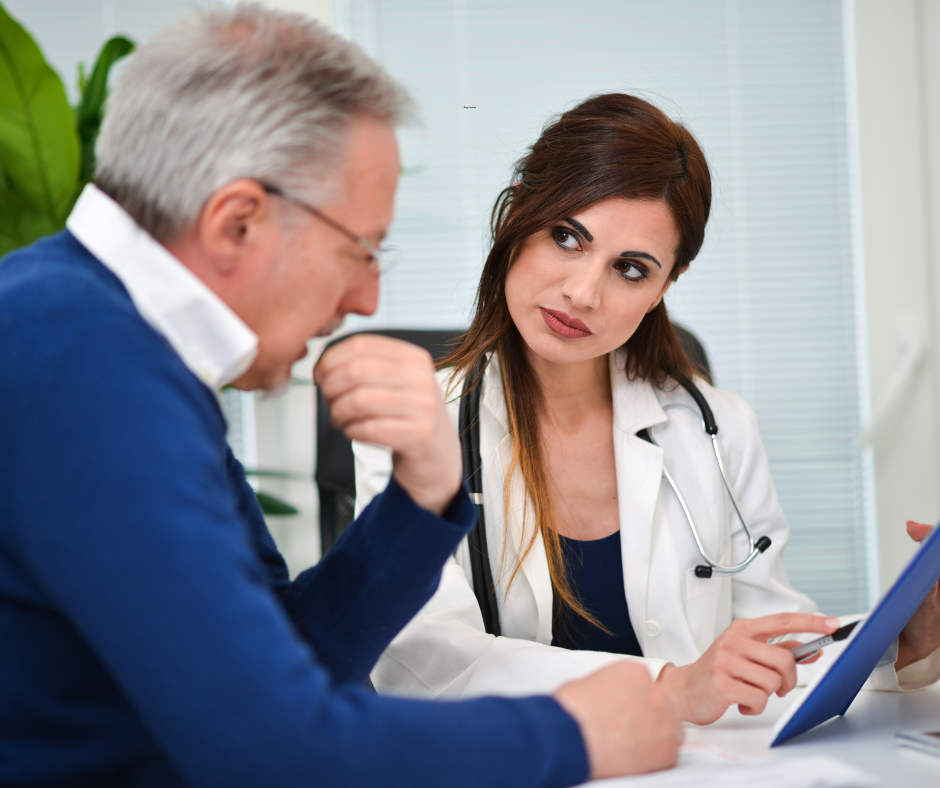 Doctor discussing dementia with senior