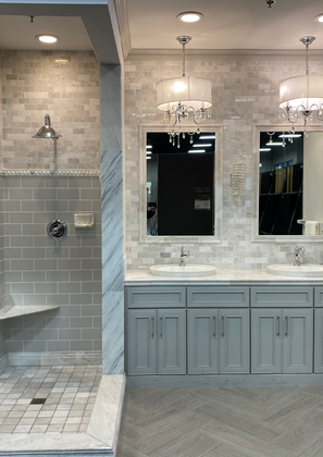 Complete bathroom remodel with spacious vanity, mirrors, and shower area.