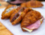 Black forrest ham and muenster cheese croissant