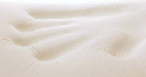 hand-is-pressing-a-memory-foam-mattress-2025-03-06-04-49-42-utc.jpg