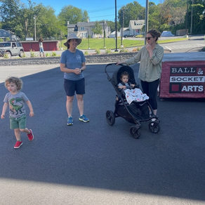 It is a beautiful day to be in Cheshire, and the sun is shining just a little brighter on West Main Street today! If you’ve been watching the incredible transformation at Ball & Socket Arts (B&SA), you know it takes a village—but every village needs a heart, and at the center of this one is the incomparable Ilona Somogyi. Richard Reggie Smith Research/Editor Creative Commons Attribution (CC BY) 4.0 AI Enhanced Ilona was one of the three original sparks who saw the potential in those historic factory walls when others might have just seen old bricks. She brings a world-class creative background to our hometown, and her energy is like a warm hug for the entire Cheshire arts community. Whether she’s navigating complex state grants or imagining how a gallery wall will look under the perfect light, she does it with a joyful spirit that reminds us all why local art matters.