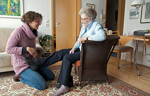 caregiver tieing shoes.jpg