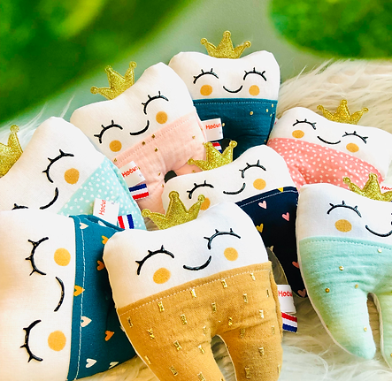 boîte à dents de lait multicolores et double gaze de coton