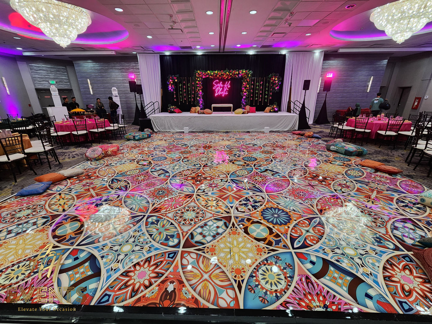 Kaleidoscope floor wrap featuring precision-mapped symmetrical geometry for a high-resolution event finish.