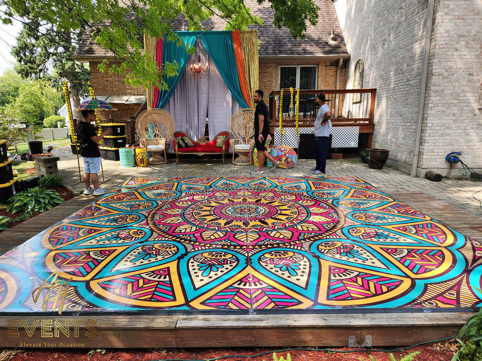 a colorful dance floor with a mandala design on it