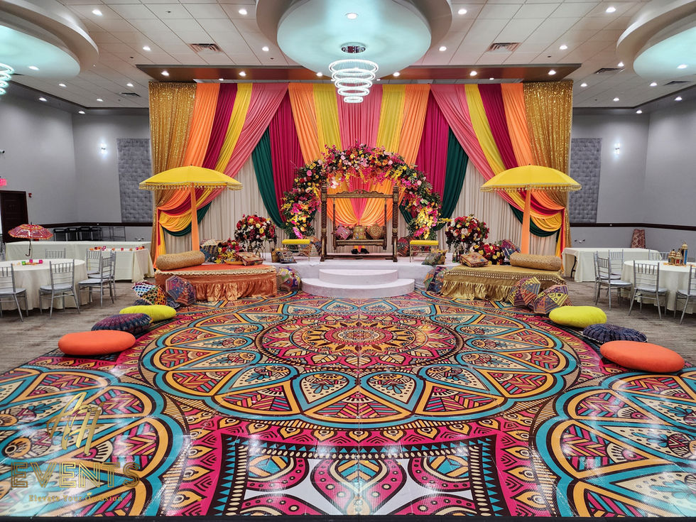 a colorful dance floor with a mandala design on it