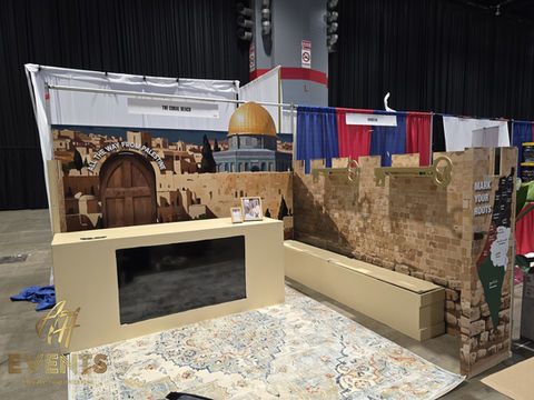 Custom-fabricated cultural exhibition backdrop by AH Crafted, featuring precision-printed architectural silhouettes