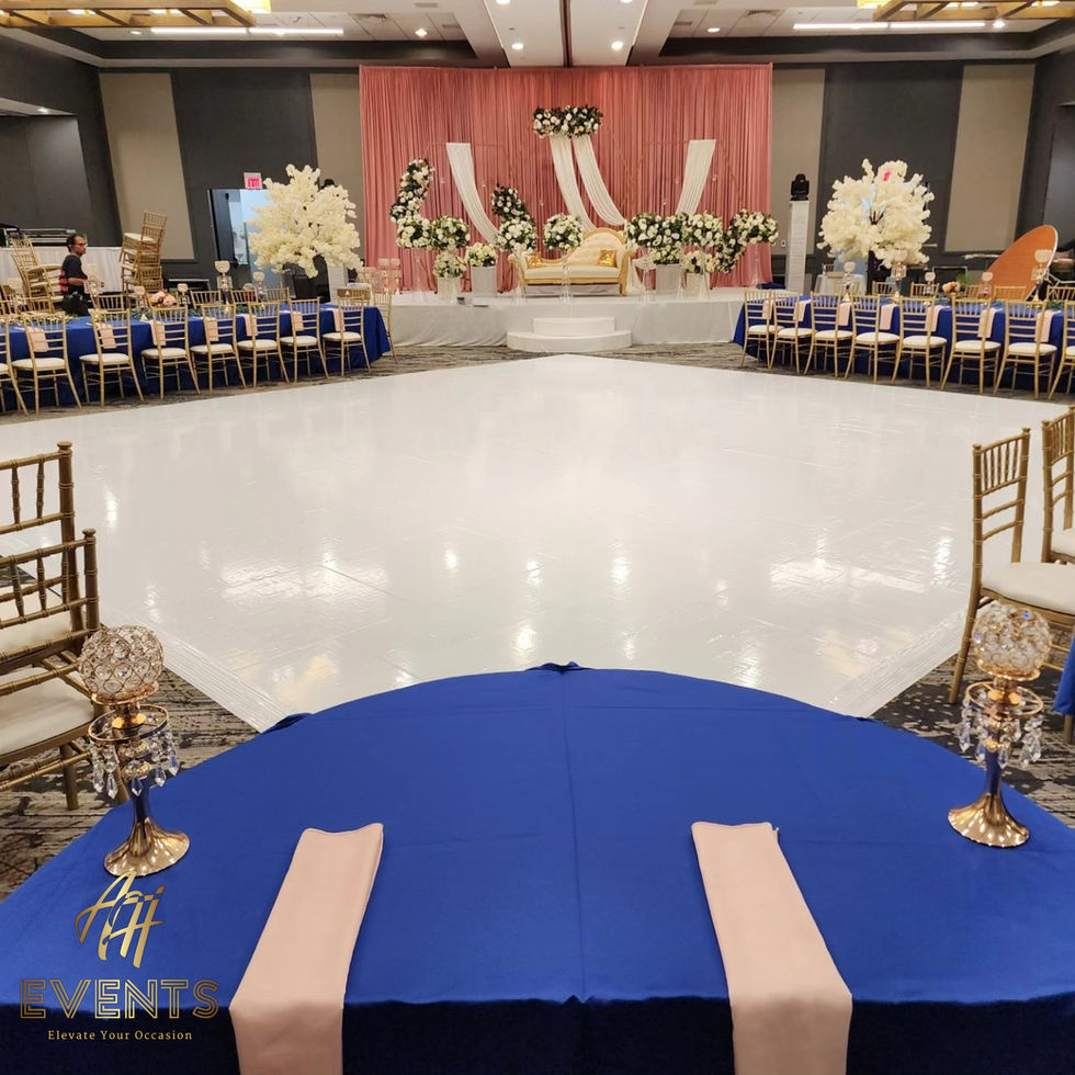 Seamless white vinyl floor wrap for a high-gloss, architectural wedding dance floor finish.