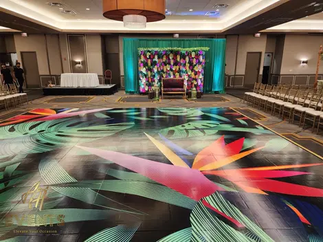 a dance floor with colorful leaves on it and the word occasion on the bottom