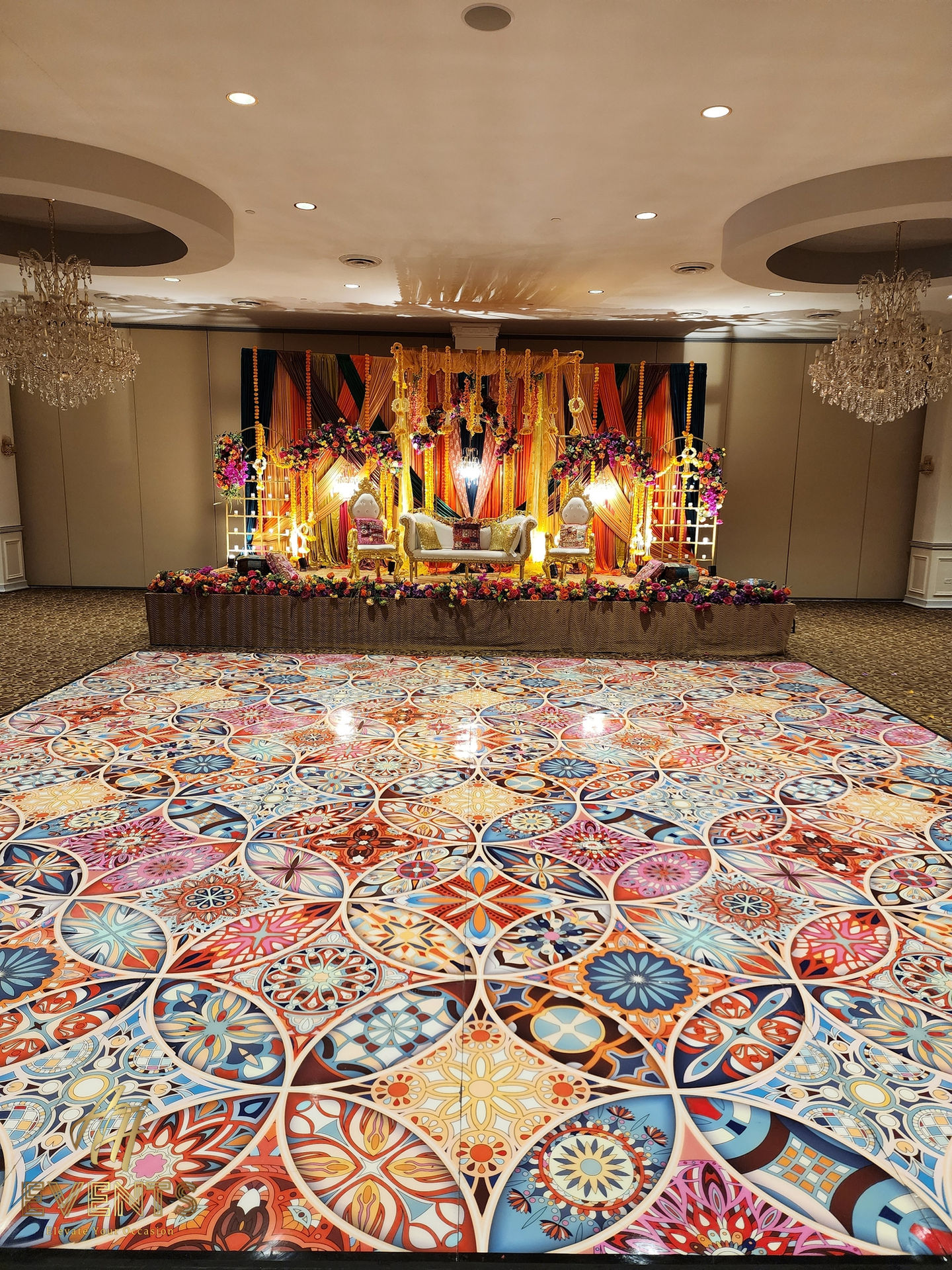 Kaleidoscope floor wrap featuring precision-mapped symmetrical geometry for a high-resolution event finish.
