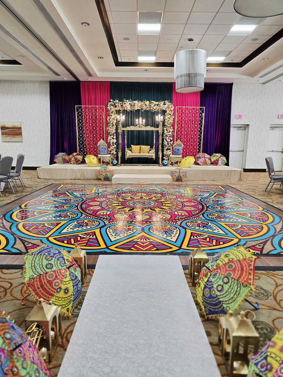 a colorful dance floor with a mandala design on it