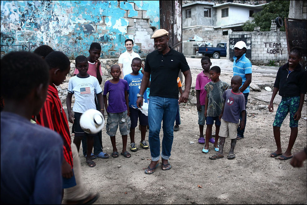 The Heart Fund - Ambassador Jimmy Jean-Louis and children Haiti