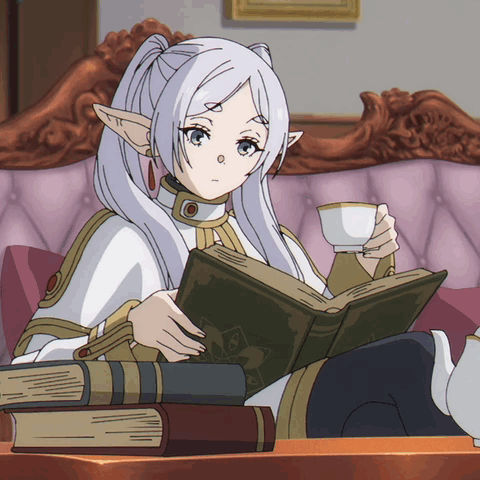 a gif of the anime character frieren, a silver haired elf wearing wizard robes, sipping tea and reading