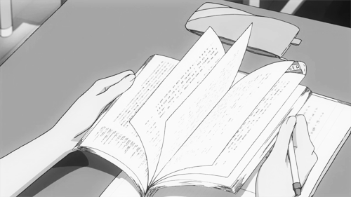 a black and white gif from the anime company studio ghibli, where a hand flips through a notebook and prepares to write