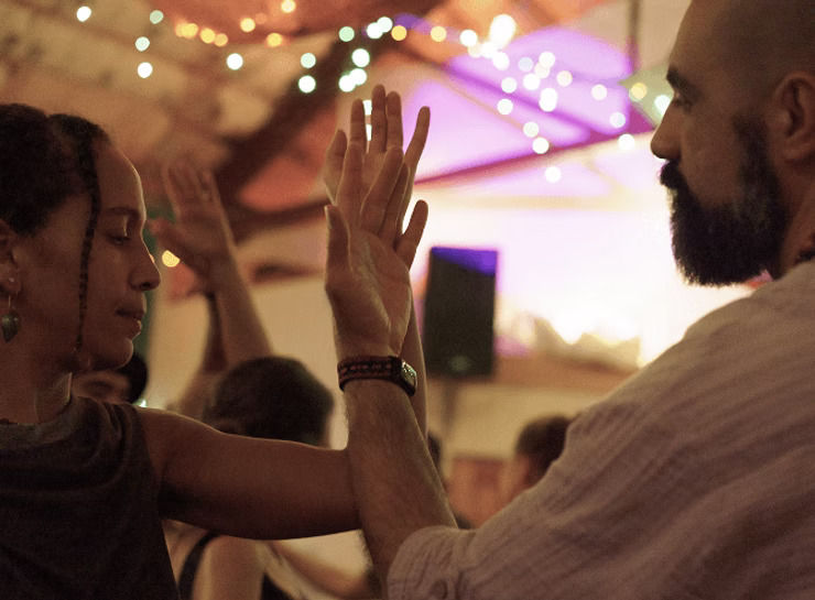Two dancers connecting during a Bloomdance event in Seattle