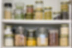 A pantry cupboard with doors open