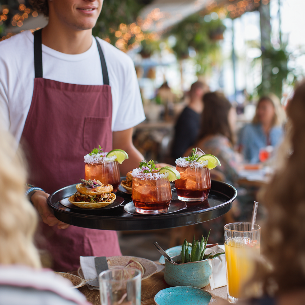 u3189798524_waiter_in_an_maroon_apron_and_white_tee_shirt_bri_005bff55-40ca-4057-8b78-fa5d