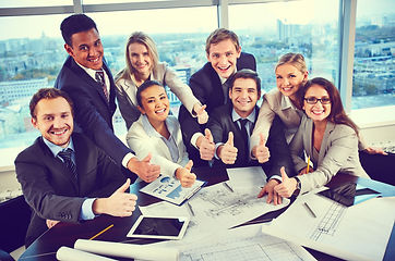 competent-team-with-thumbs-up.jpg