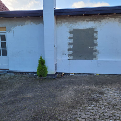 Isolering på et facade