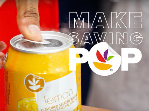 Picture of hand opening a can of GIANT Brand lemon seltzer water