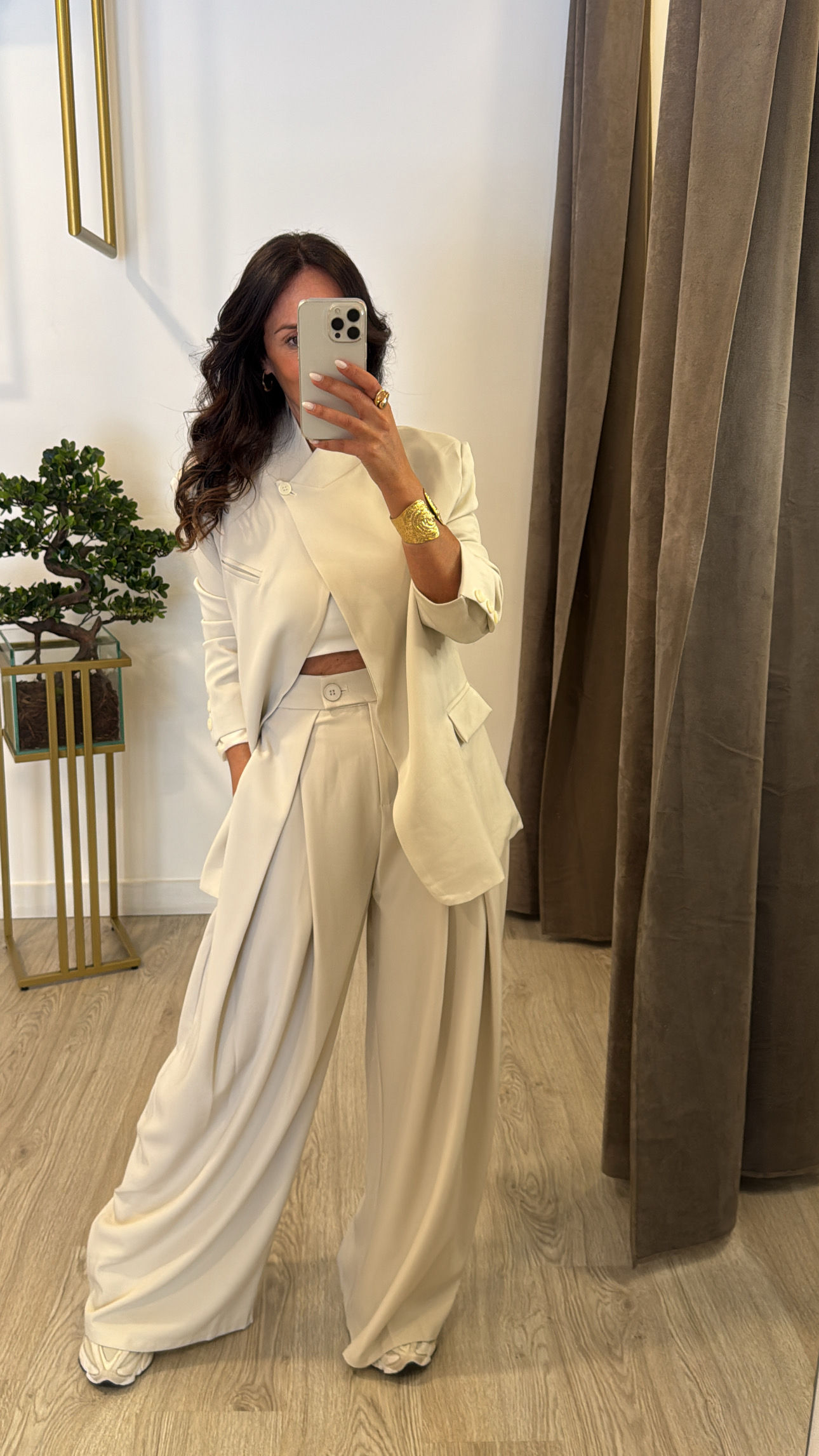 Calça com pregas 