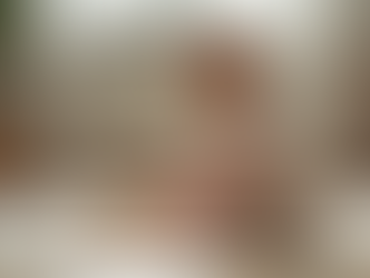 A child engaging in unstructured play with wooden blocks