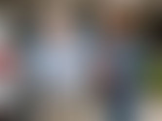 dauther helping elderly mother into car