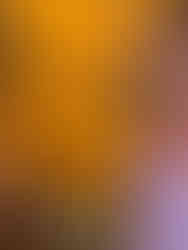 Screenshot of a singer reacting to someone talking to her