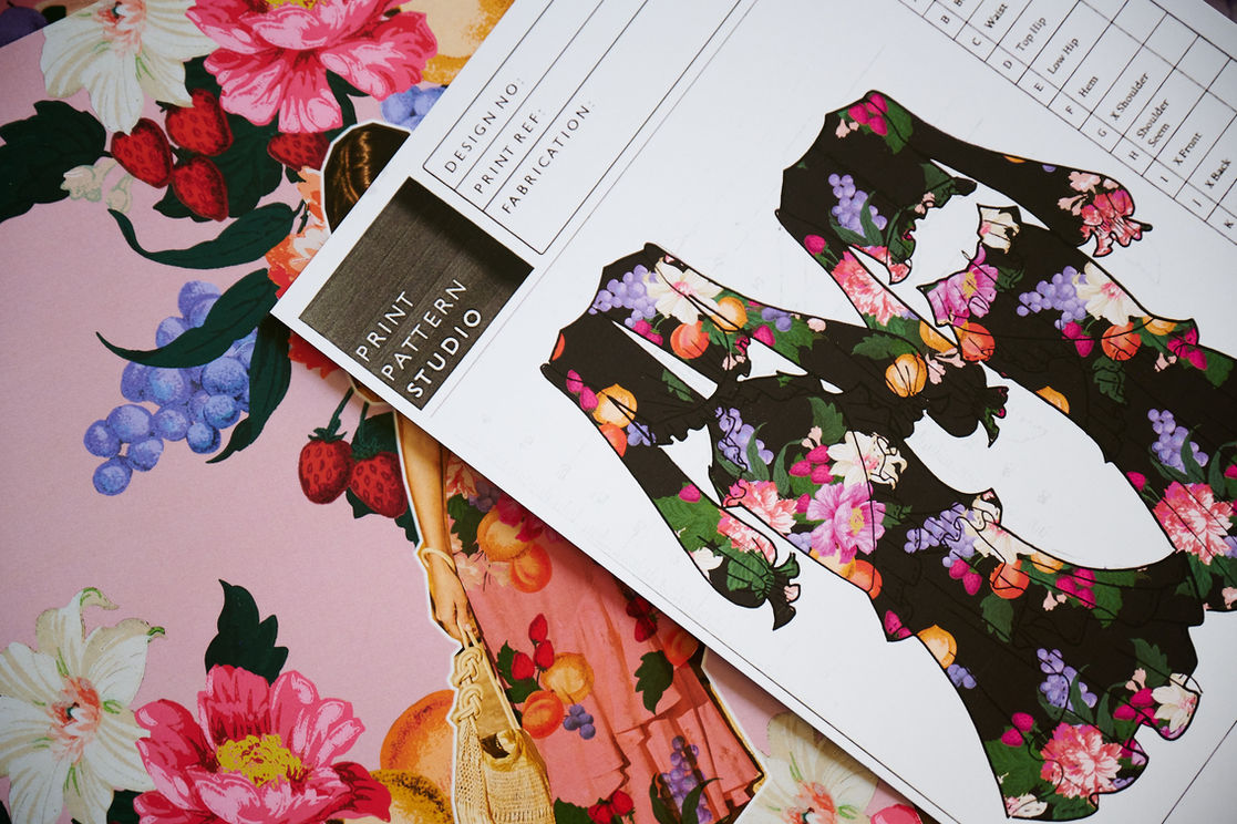 A technical fashion illustration of a dress shap with a print design overlayed by print pattern archive. The floral design is dark ground. By print pattern archive