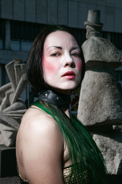 Explore a visually striking editorial series blending classical beauty with avant-garde elements. Featuring bold red blush, ethereal makeup, and sculptural fashion, this high-concept shoot captures a haunting elegance that pushes the boundaries of fashion photography