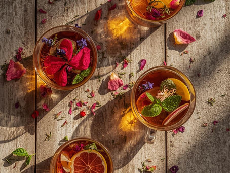  plant infusion made from herbs, flowers, fruits, roots, or spices 