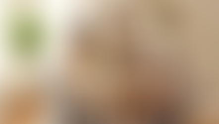 Family enjoying a peaceful meal together in a bright, comfortable dining room, symbolizing stability, respect, and dignity – key reasons why consumers choose rent-to-own.