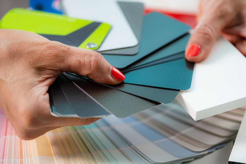 woman-looking-at-color-palettes-for-interior-decor-2024-10-18-12-16-54-utc.jpg