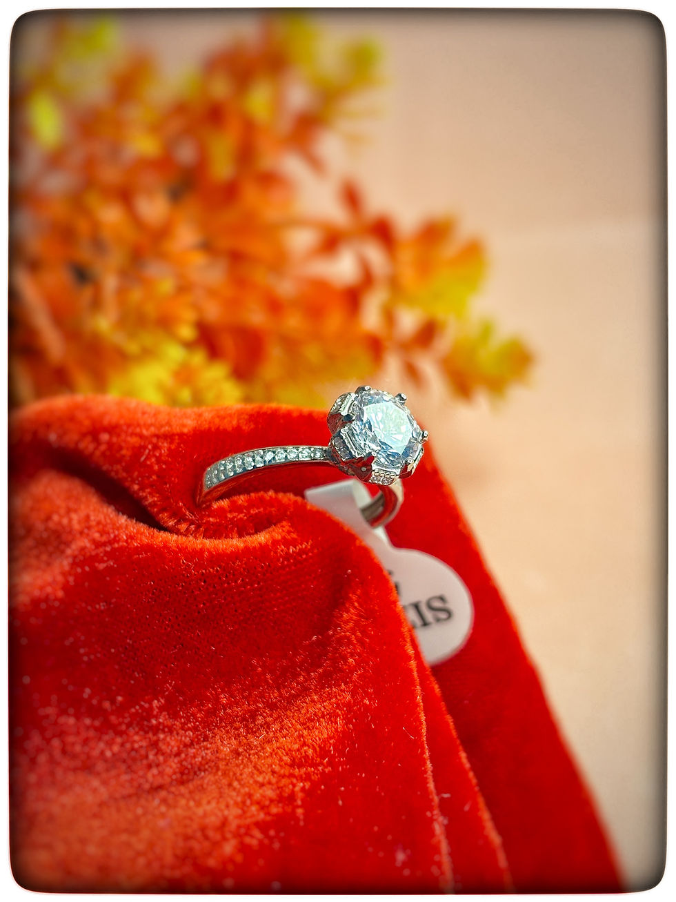 925 sterling silver solitaire engagement ring with a central stone and side accents, available in size 5 – Tanyam Jewellers