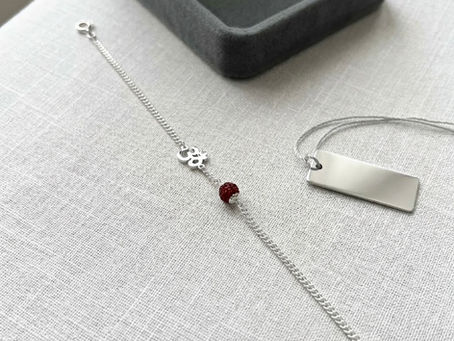 Om & Rudraksh Silver Bracelet by tanyam jewellers