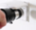 Closeup of plugging central vacuum cleaner hose in to wall inlet socket._edited.jpg