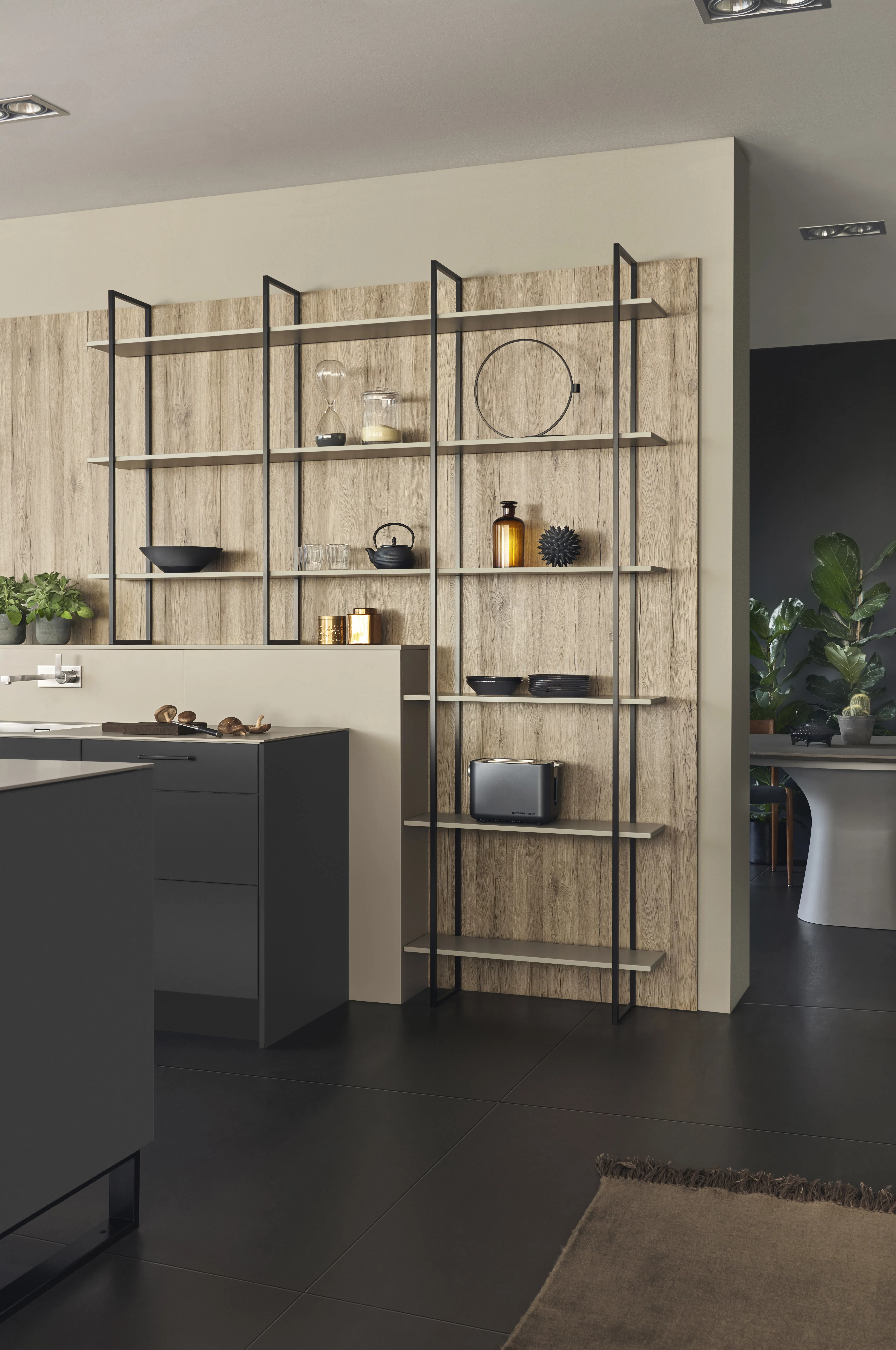 Minimalist kitchen with open shelving and sleek, modern design.