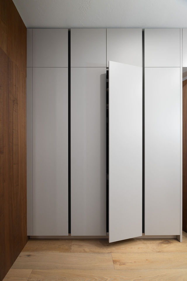 Modern lounge kitchen with sleek cabinetry and open-concept design