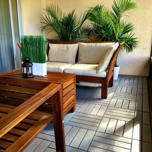 Plastic decking boards used on a patio for easier maintenance.