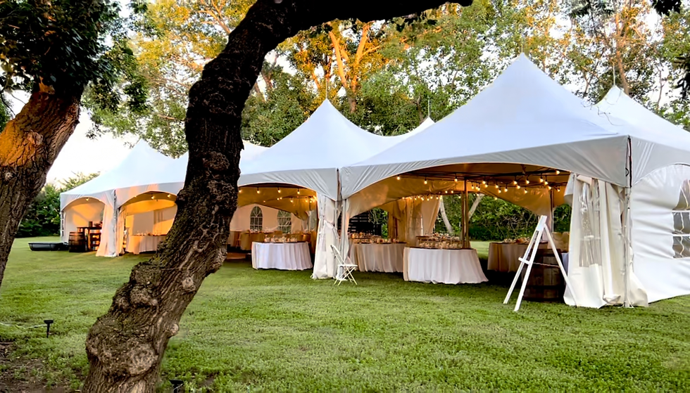 Large white marquee tent setup for garden wedding in Kuala Lumpur