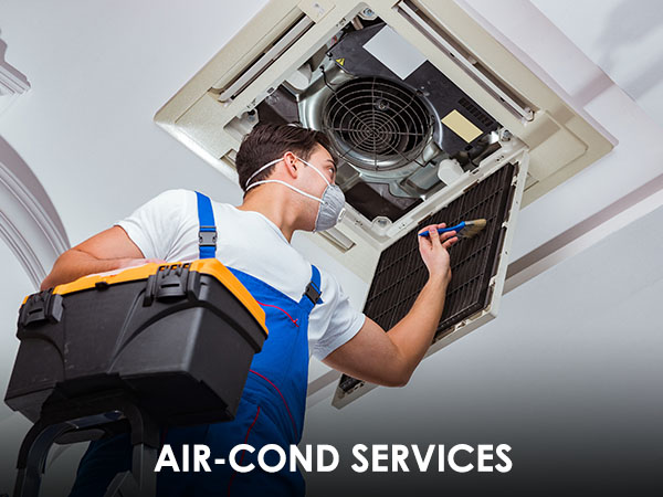 Routine aircond servicing in high-rise unit near KLCC with skyline view